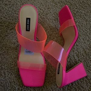 Medium pink slides. Never worn